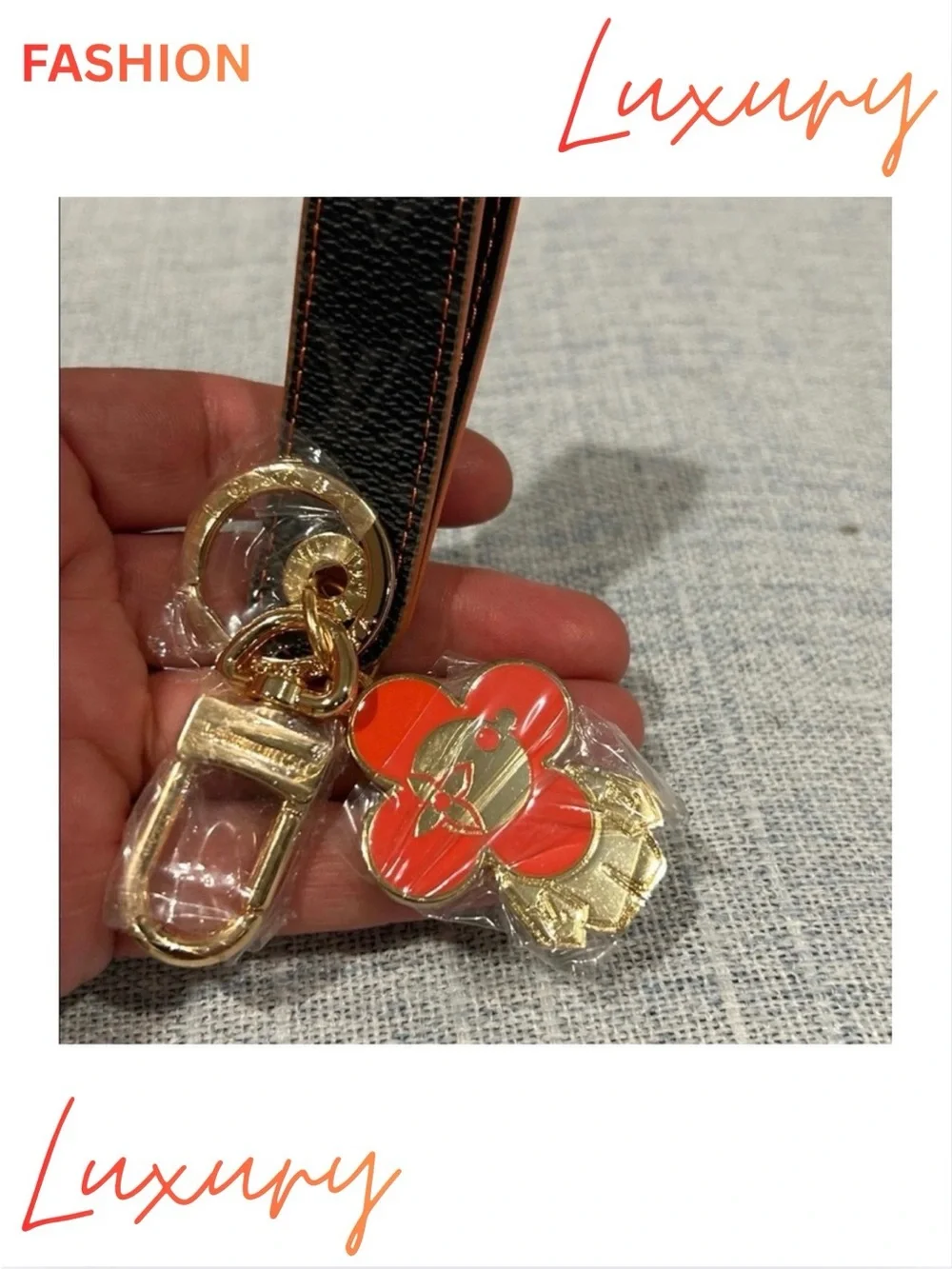 KEYCHAIN BAG CHARM WRISTLET: Gold & Orange Floral Figure w/Brown Leather Strap